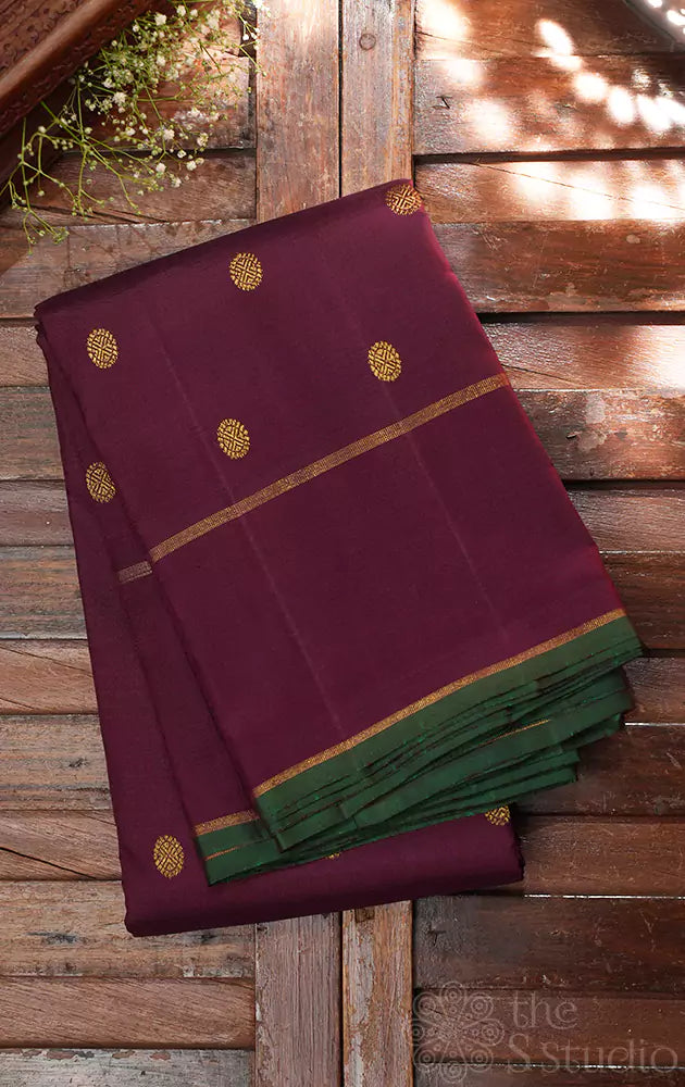 Brown kanchi silk saree with small buttas and rettai pet border