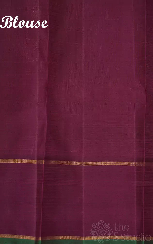 Brown kanchi silk saree with small buttas and rettai pet border