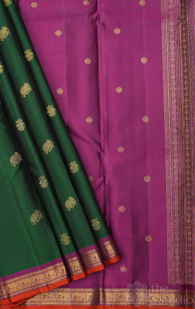 Dark green kanchipuram silk saree with small border