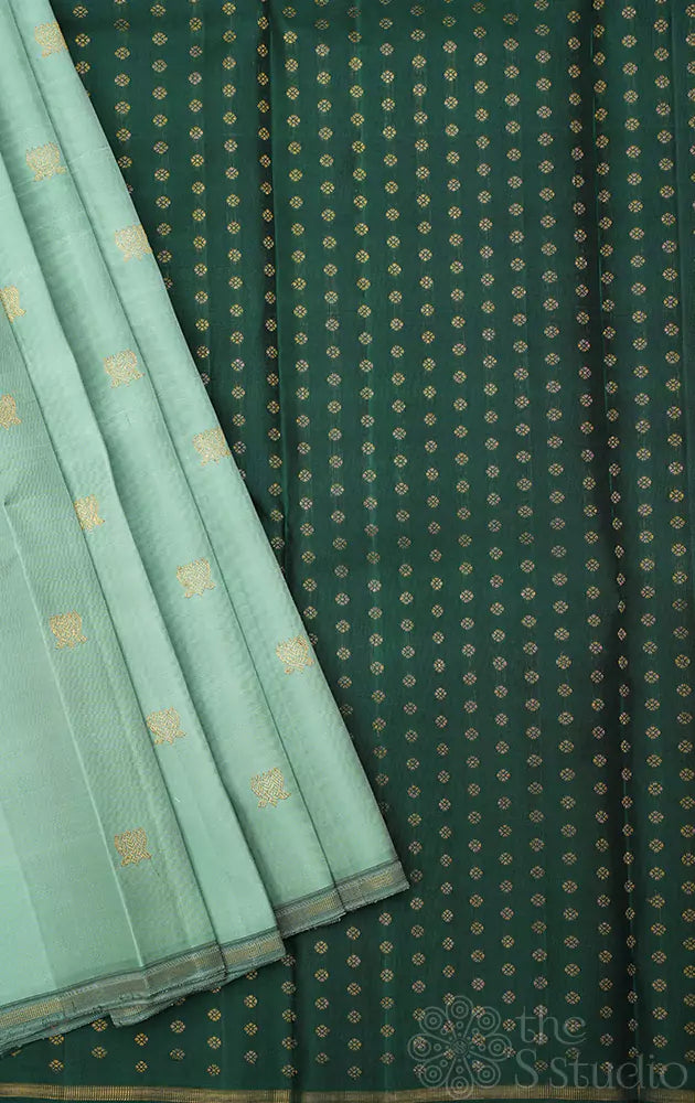 Pale green lotus butta kanchi silk saree with dark green pallu