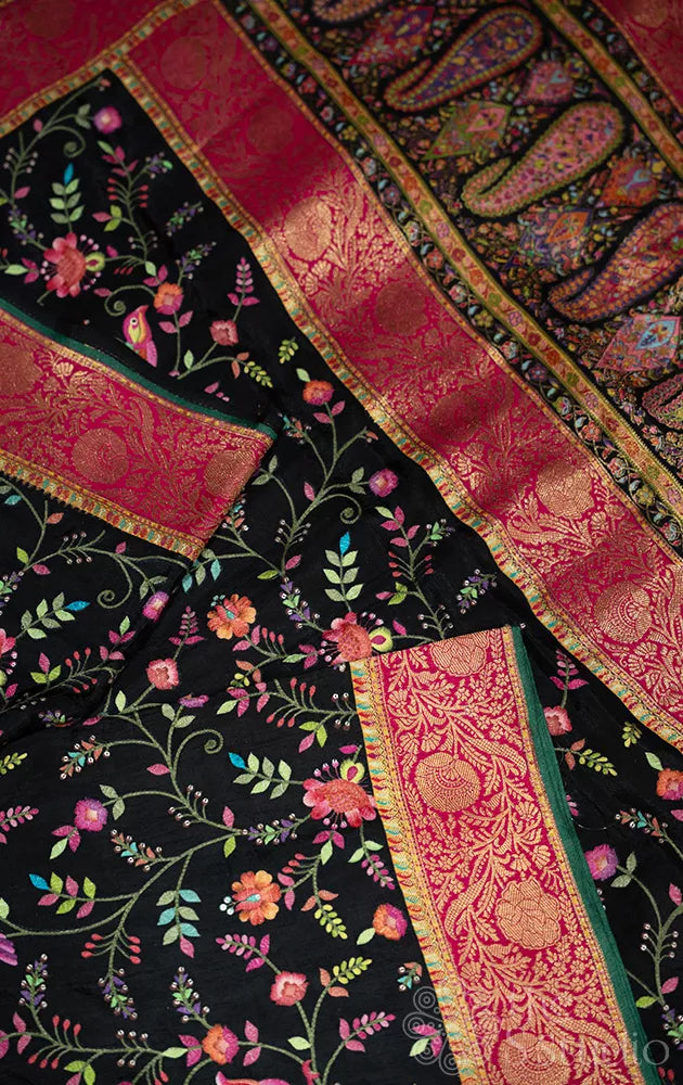 Black semi crepe banarasi silk saree with floral embroidery and contrast border