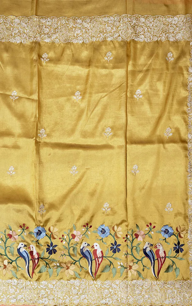 Light yellow semi banarasi silk saree with bird embroidery