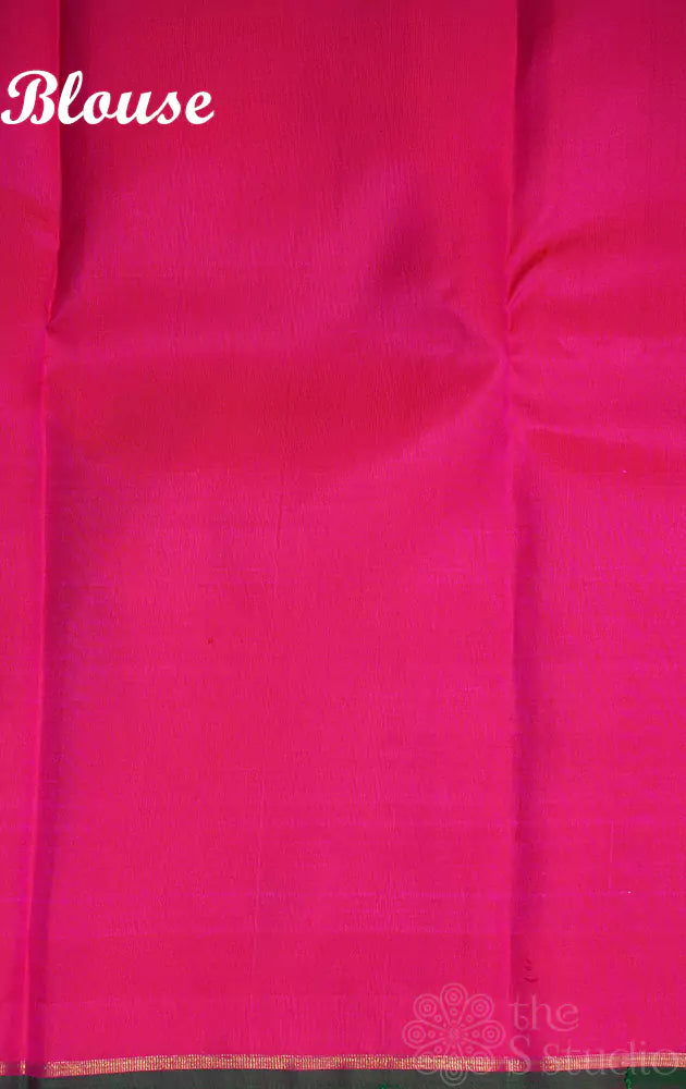 Rani pink kanjivaram saree with peacock border buttas