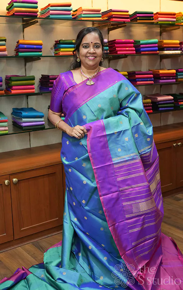 Peacock blue kanjivaram silk saree with purple border