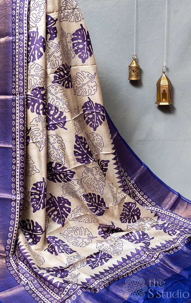 Off white tussar silk saree with violet leaf prints
