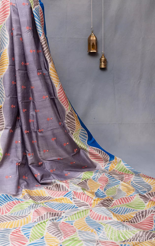 Grey tussar silk saree with hand-painted leaf designs and kutch embroidery