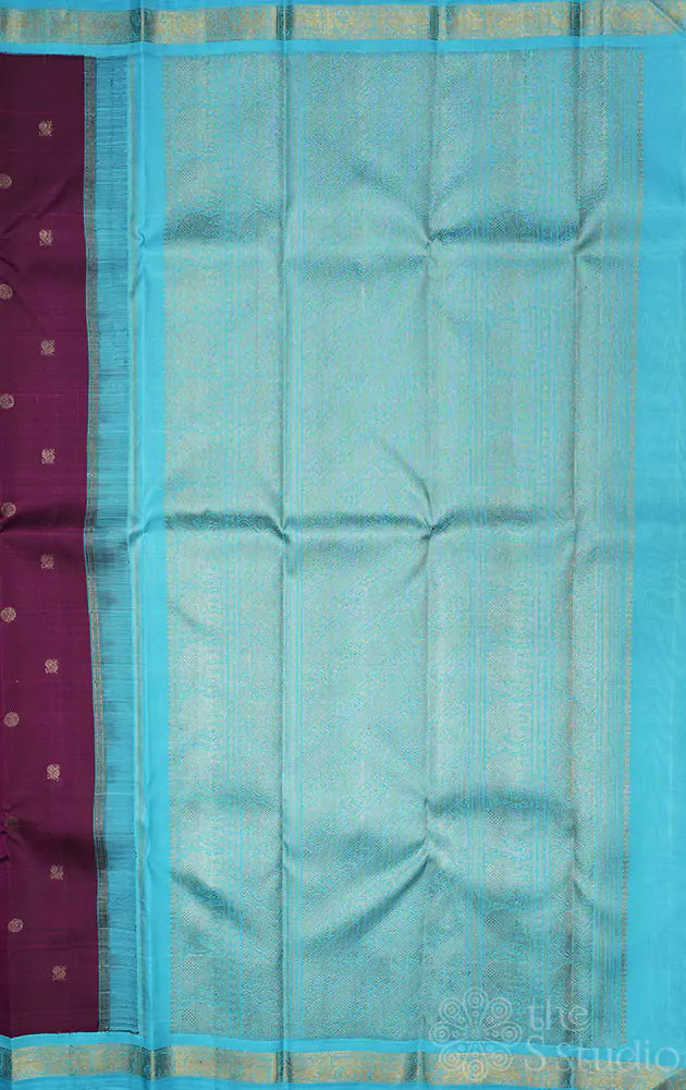 Purple kanchipuram silk saree with korvai blue border