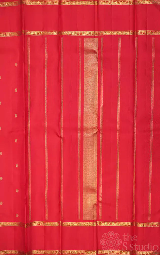 Red kanchi silk saree with small buttas and rettai pet border