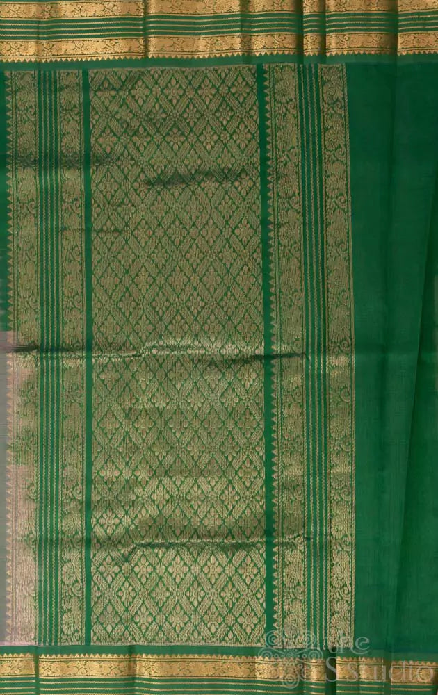 Light peach silk cotton saree with green rettaipet border