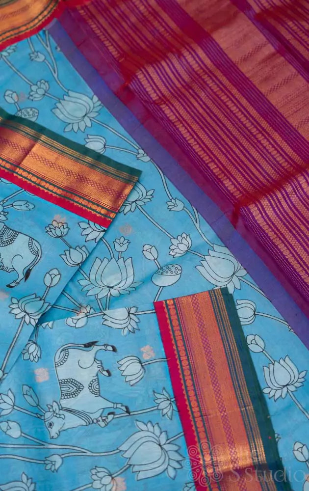 Light blue korvai silk cotton saree with magenta border