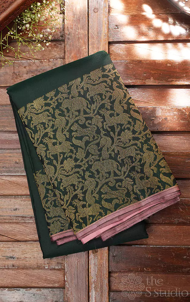 Green kanchipuram silk saree with vanasingharm border