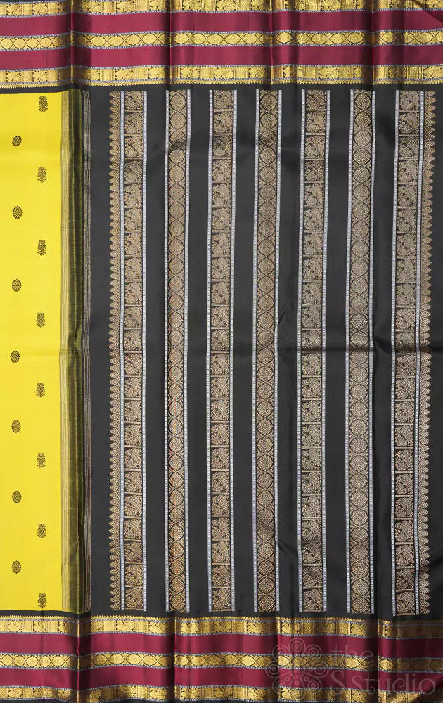 Sampanga green kanjivaram saree with black and maroon border