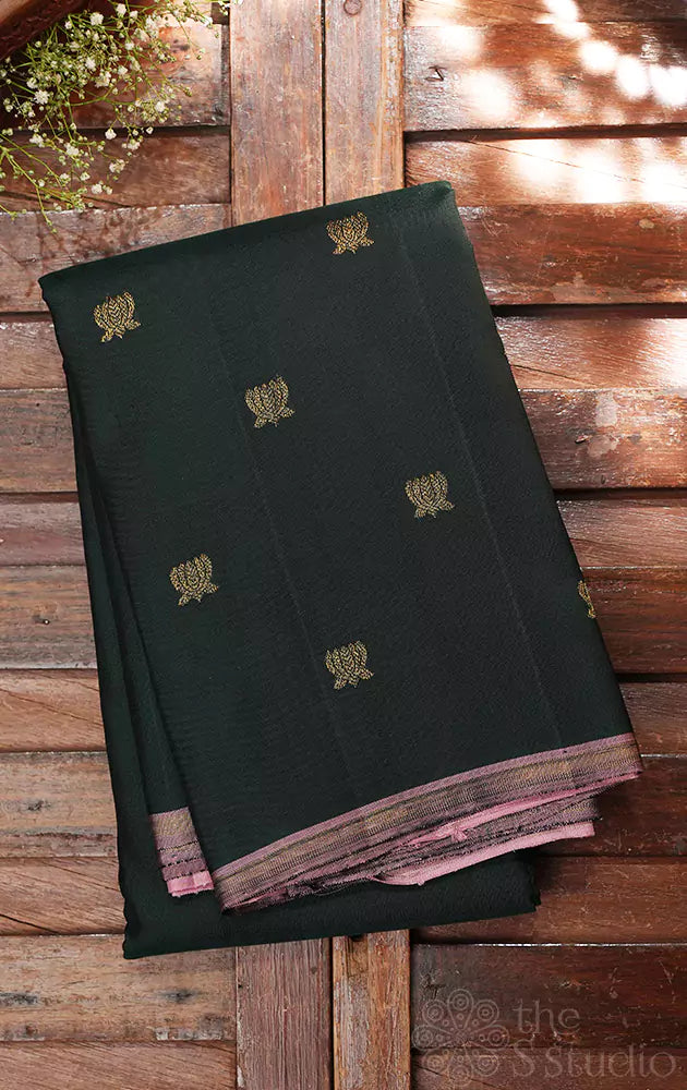 Bottle green kanchi pattu saree with lotus buttas