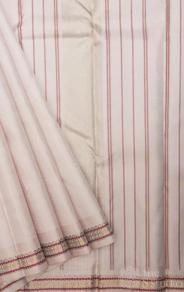 Off white plain kanchi silk saree with small zari border