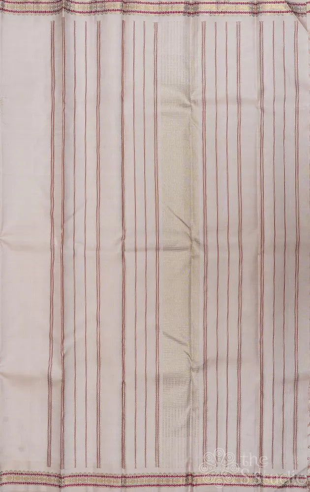 Off white plain kanchi silk saree with small zari border