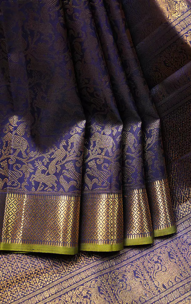 Navy blue kanchi silk saree with vanasingharam border