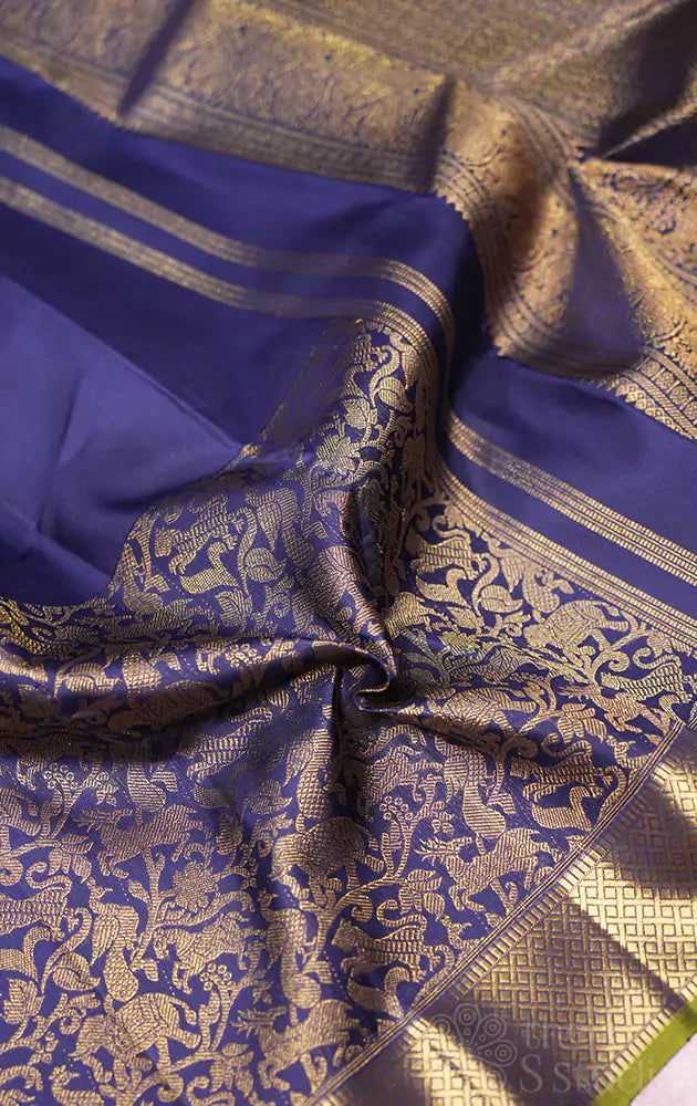 Navy blue kanchi silk saree with vanasingharam border