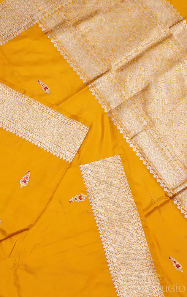 Mustard katan banarasi silk saree adorned with kadwa butta