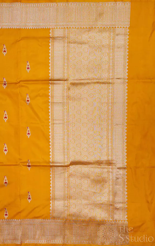 Mustard katan banarasi silk saree adorned with kadwa butta