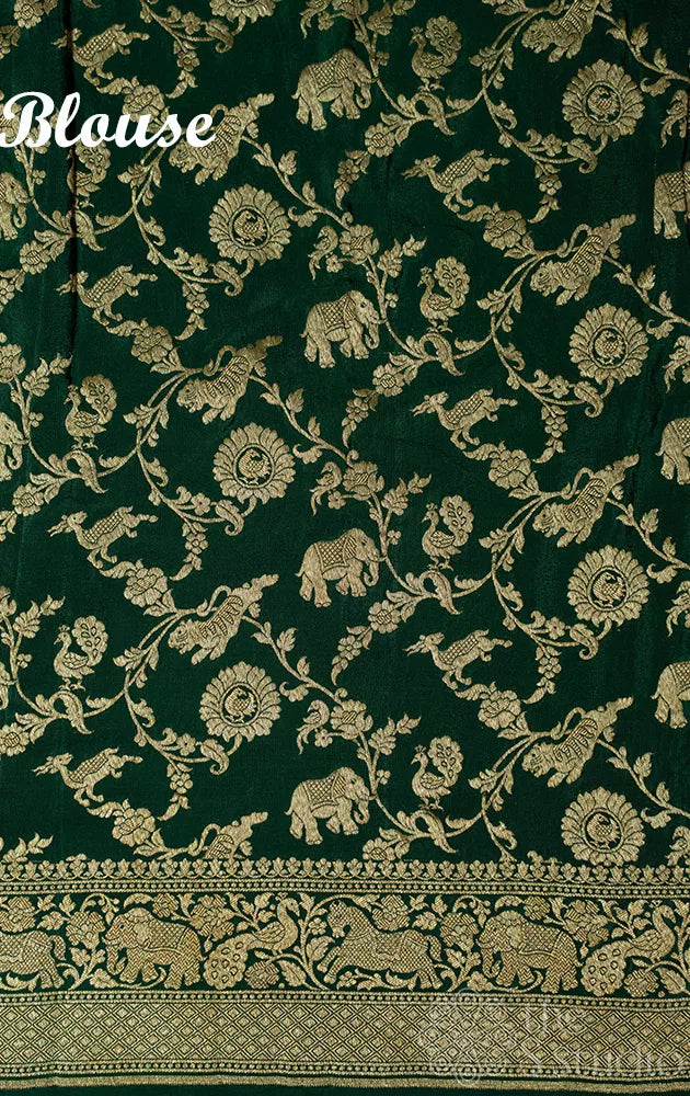 Green crepe banarasi silk saree with animal antique zari buttas