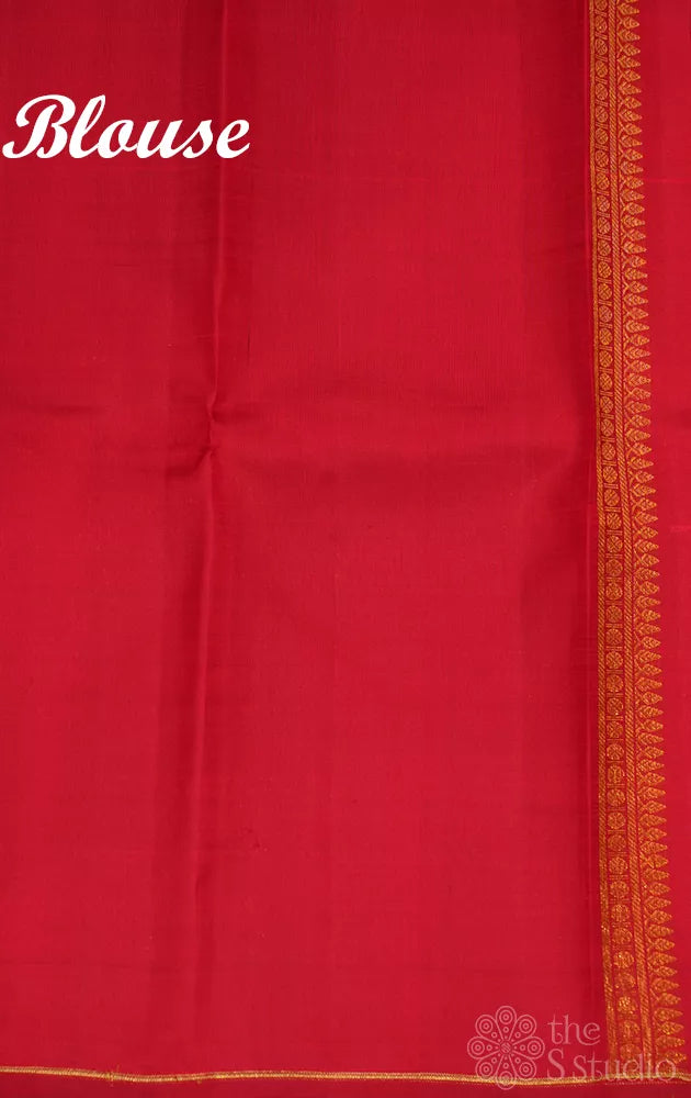 Peacock blue borderless kanchi silk saree with kolam buttas