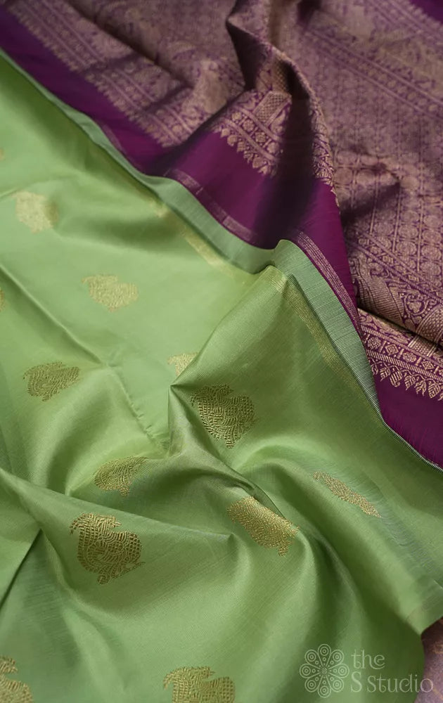 Elachi green kanchipuram silk saree with zari rich purple pallu