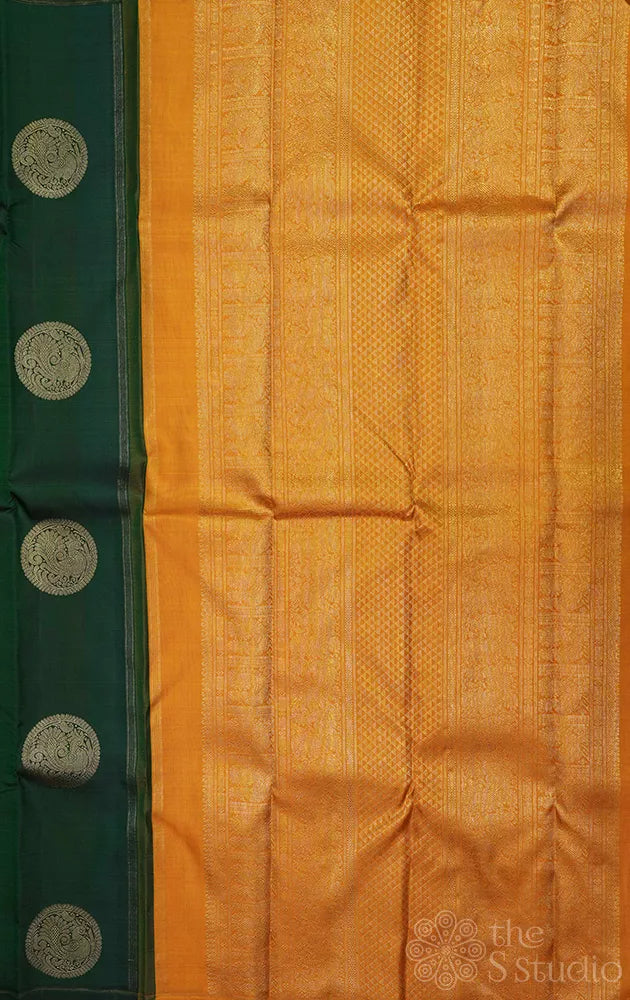 Bottle green kanjivaram silk saree with mustard pallu