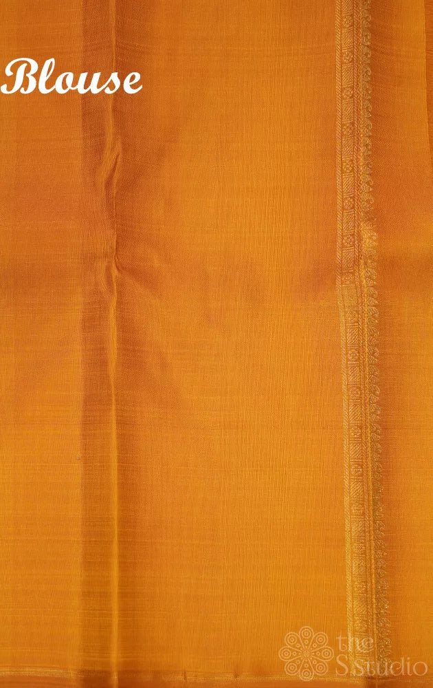 Bottle green kanjivaram silk saree with mustard pallu