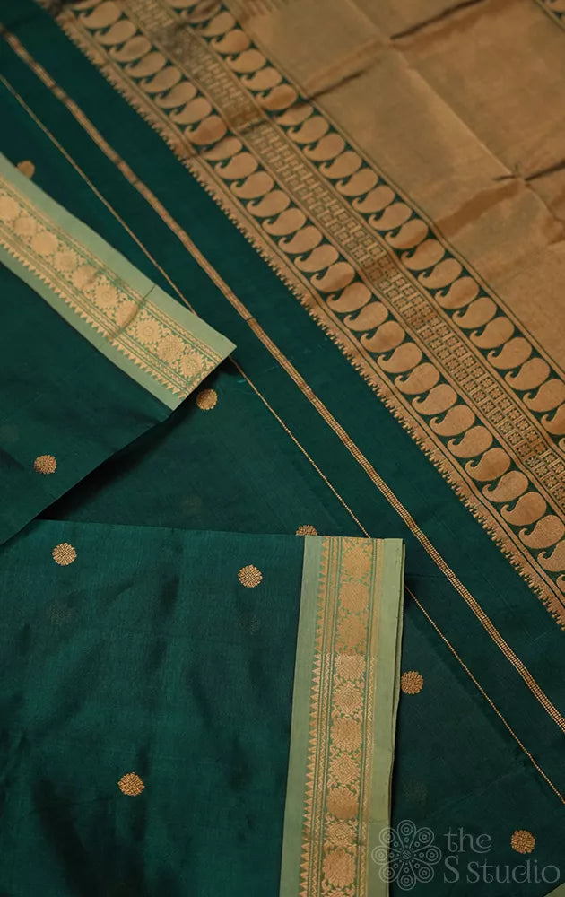 Bottle green silk cotton saree with small zari border