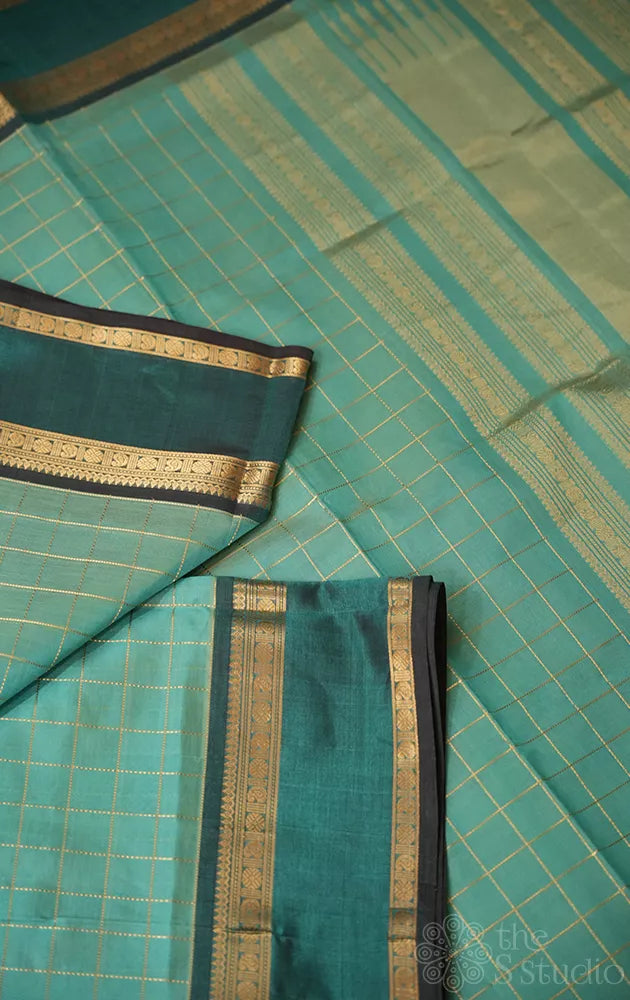 Pista green checked silk cotton saree with rettaipet border