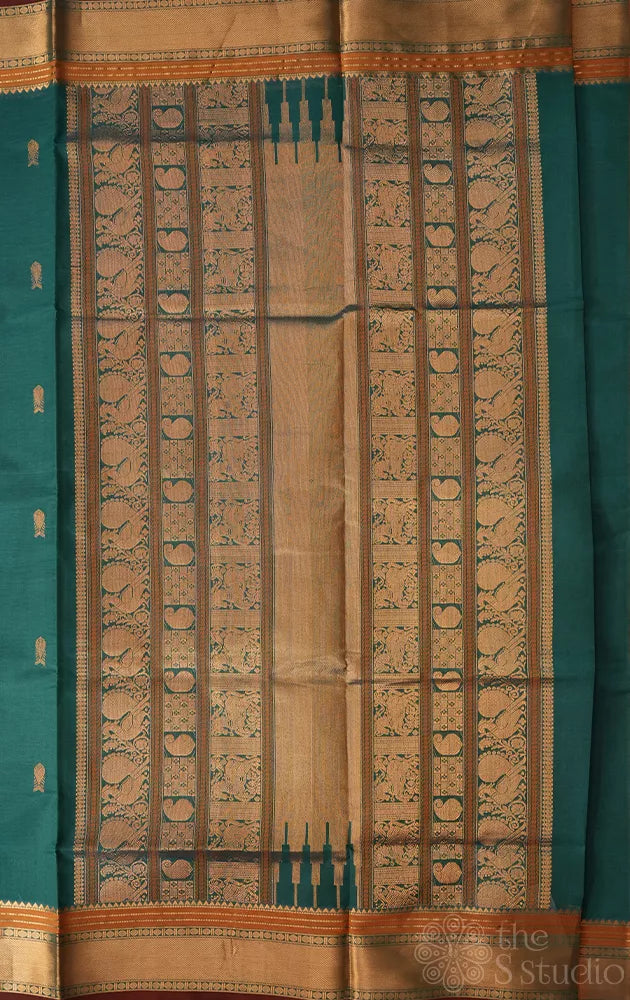 Teal blue silk cotton saree with fishpet motif