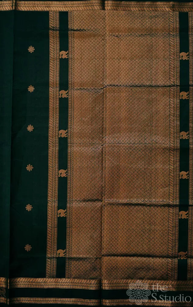 Bottle green silk cotton saree with rettai pet border