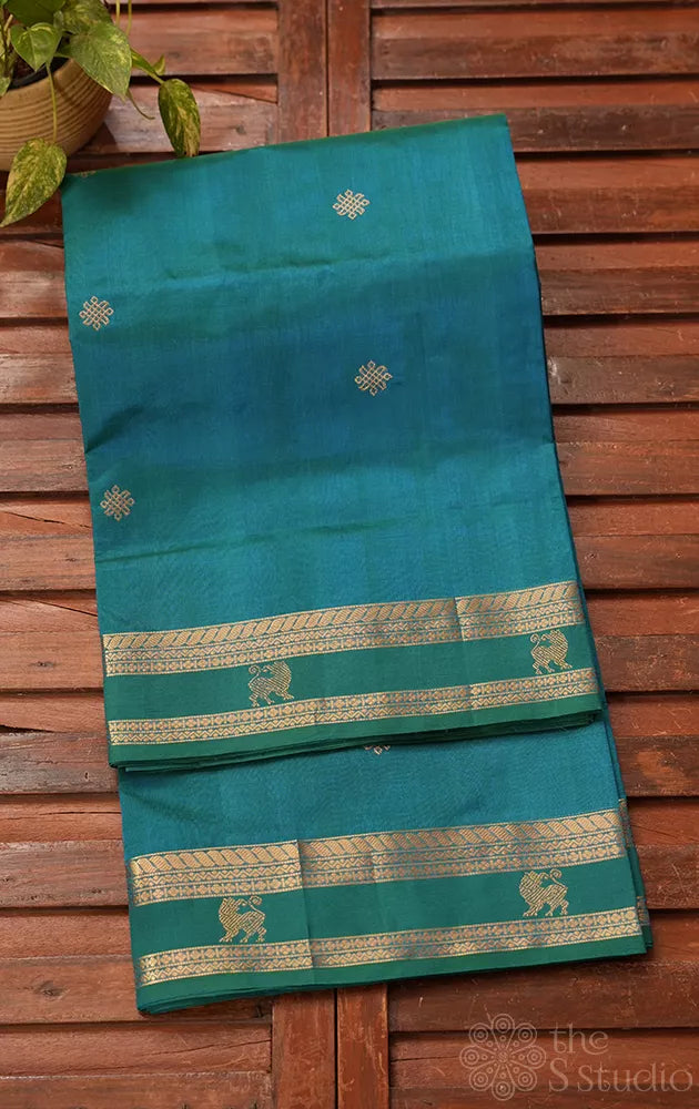 Teal blue silk cotton saree with rettai pet border