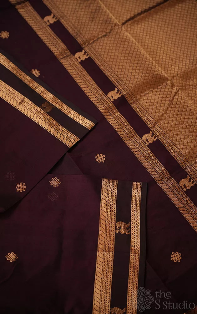 Dark purple silk cotton saree with zari border and yazhi motif