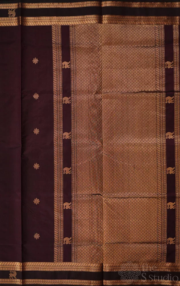 Dark purple silk cotton saree with zari border and yazhi motif