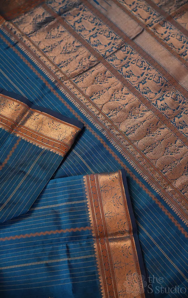 Blue silk cotton saree with vertical lines and zari border
