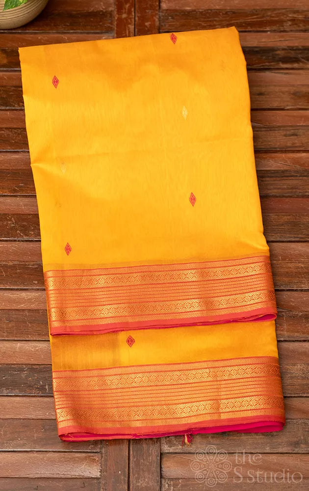 Mustard yellow maheshwari silk cotton saree with rani pink border