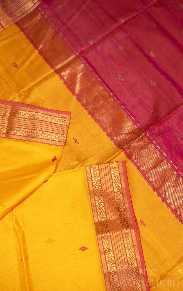 Mustard yellow maheshwari silk cotton saree with rani pink border