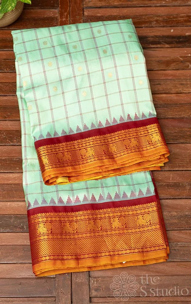 Sea green colour checked gadwal silk saree with maroon kuttu border
