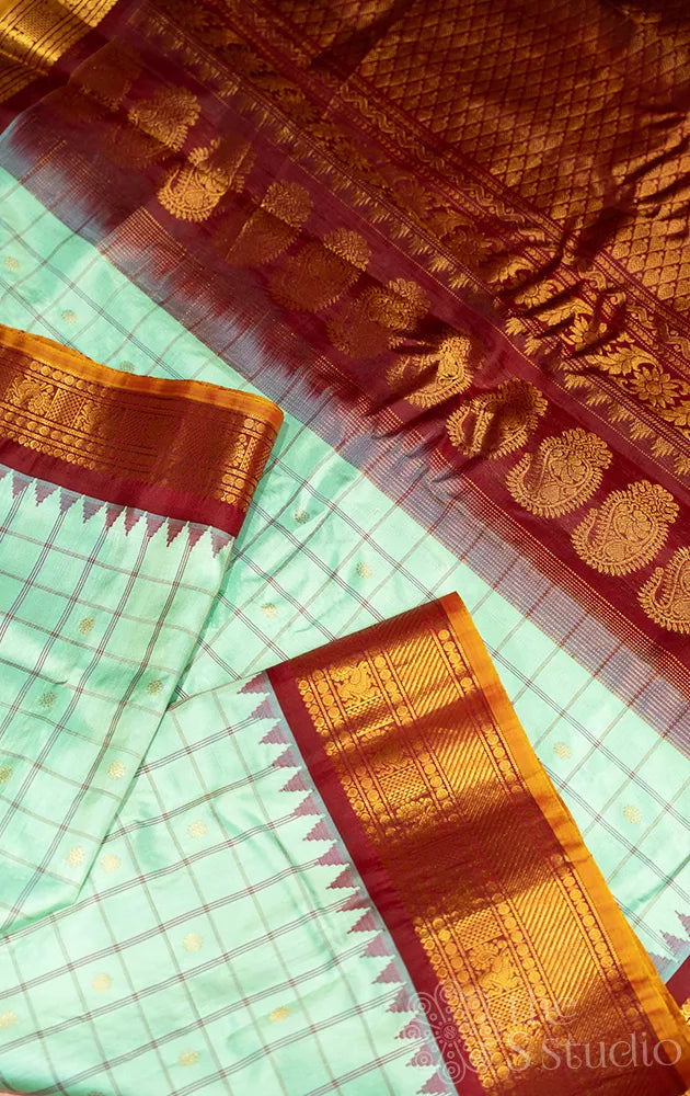 Sea green colour checked gadwal silk saree with maroon kuttu border