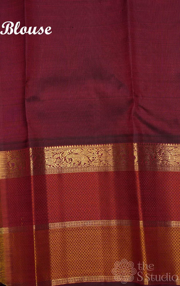 Peacock blue kanchipuram silk saree with maroon korvai border