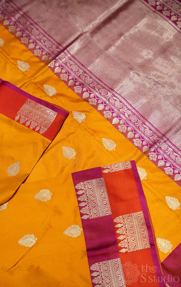 Mango yellow katan banarasi silk saree with double colour border