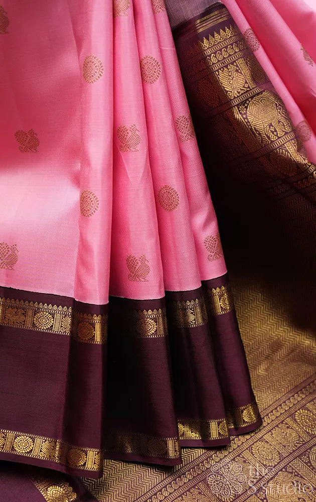 Pink kanchi silk saree with korvai brown rettai pet border