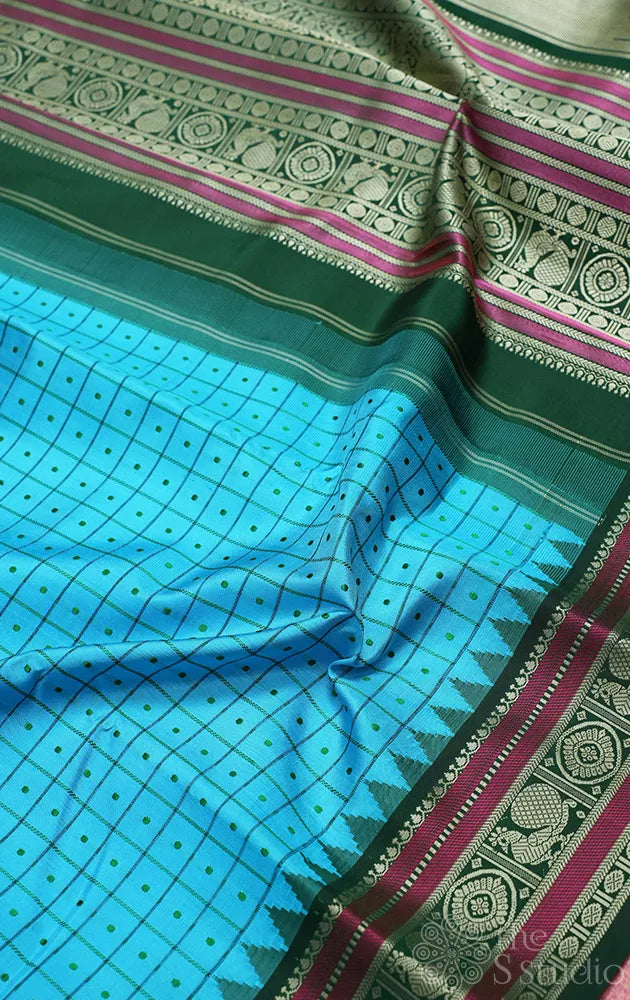 Anandha blue threadwork kanjivaram saree with korvai green border