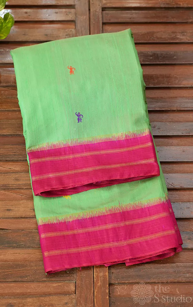 Light green raw silk saree with pink border