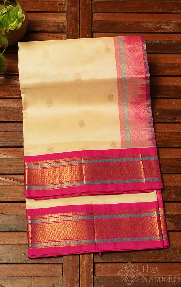 Off white silk cotton saree with contrast korvai pink border