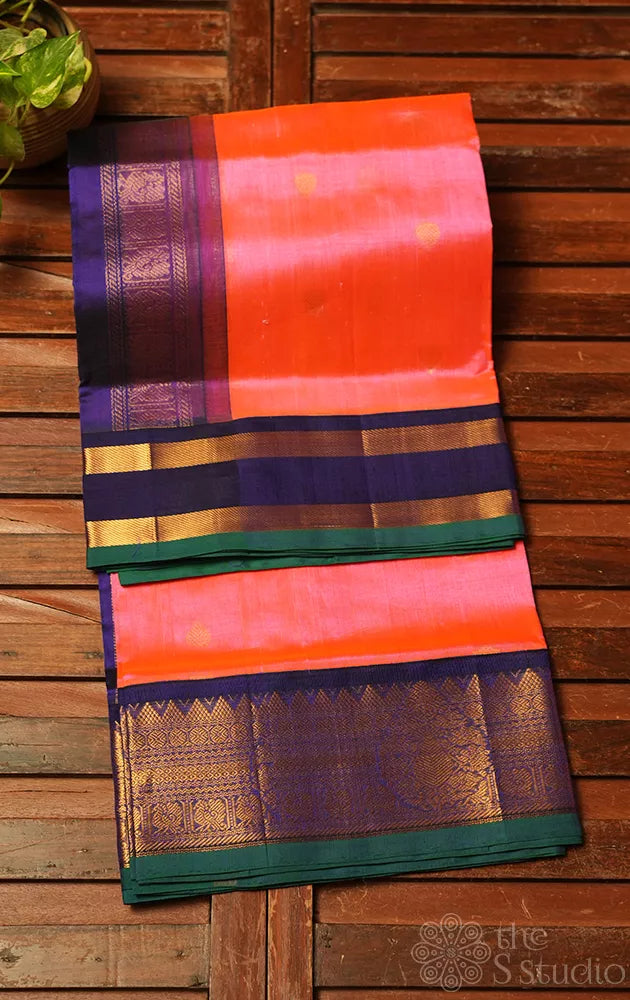 Peach silk cotton saree with korvai navy blue border