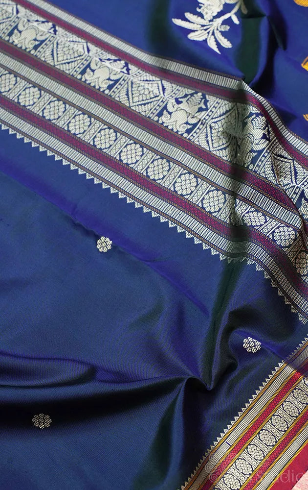 Peacock blue kanchipuram threadwork silk saree with pichwai cow woven motifs