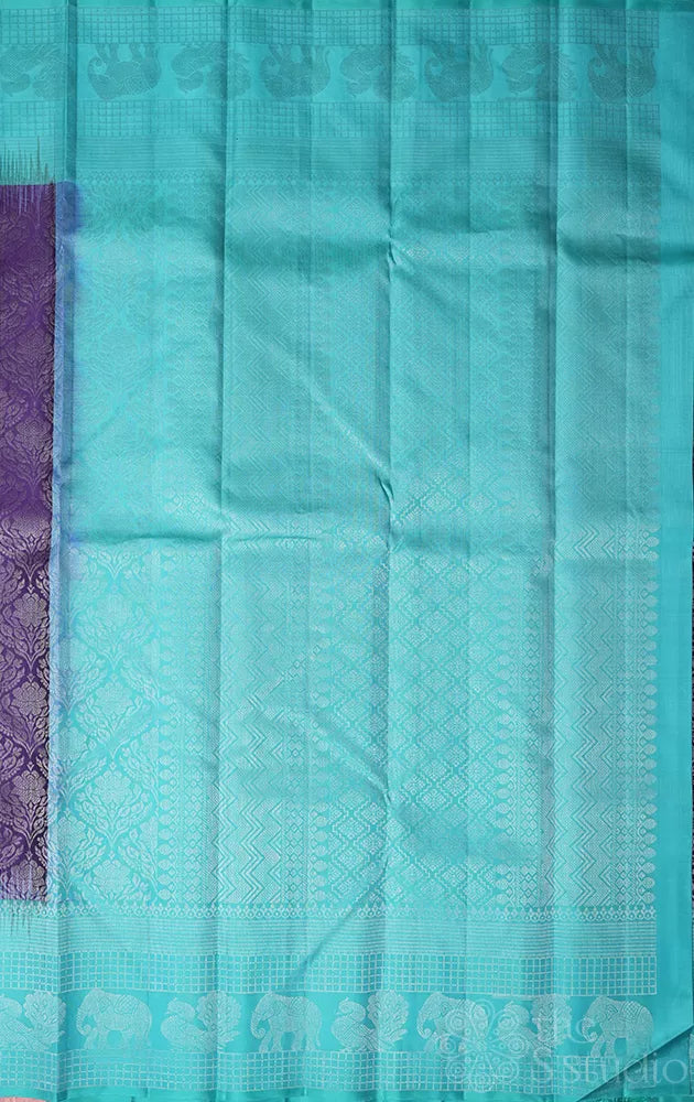 Violet soft silk saree with sea blue border and pallu