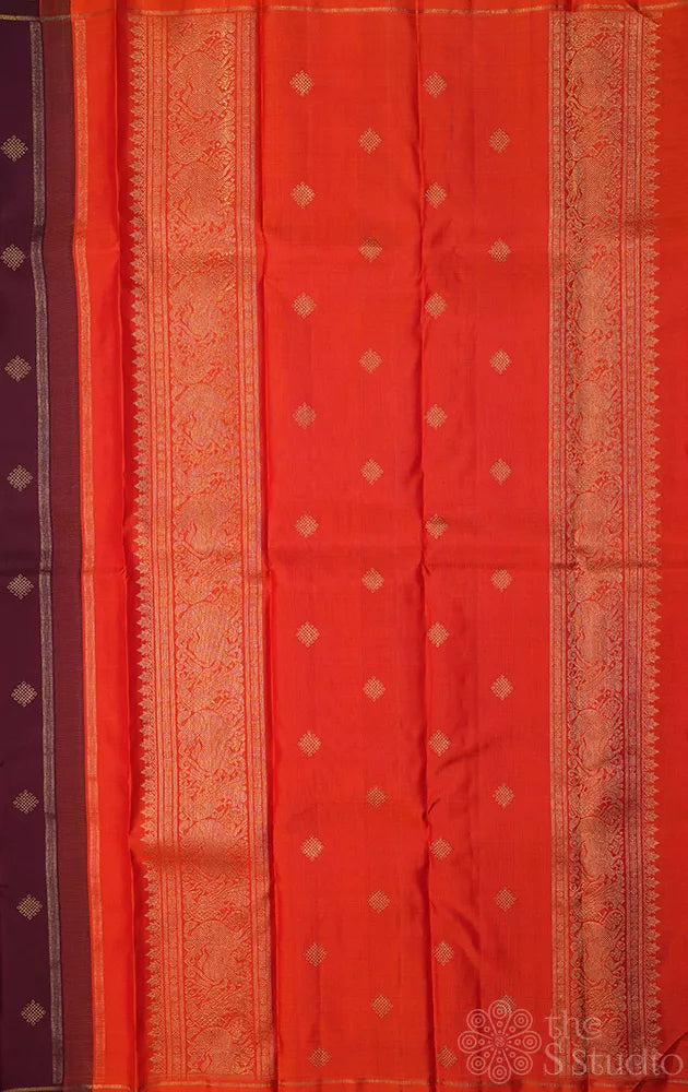 Brown kolam butta kanjivaram saree with orange pallu and blouse